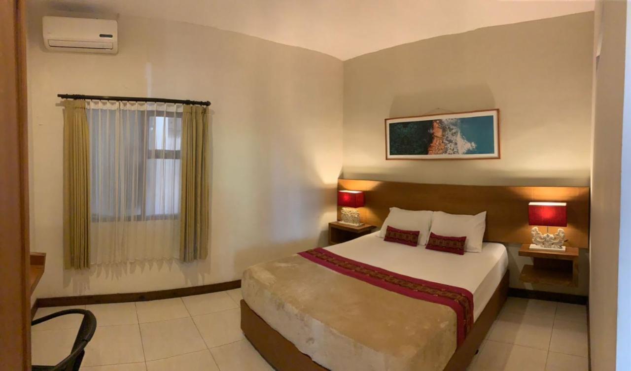 Kuta Suci Guesthouse מראה חיצוני תמונה