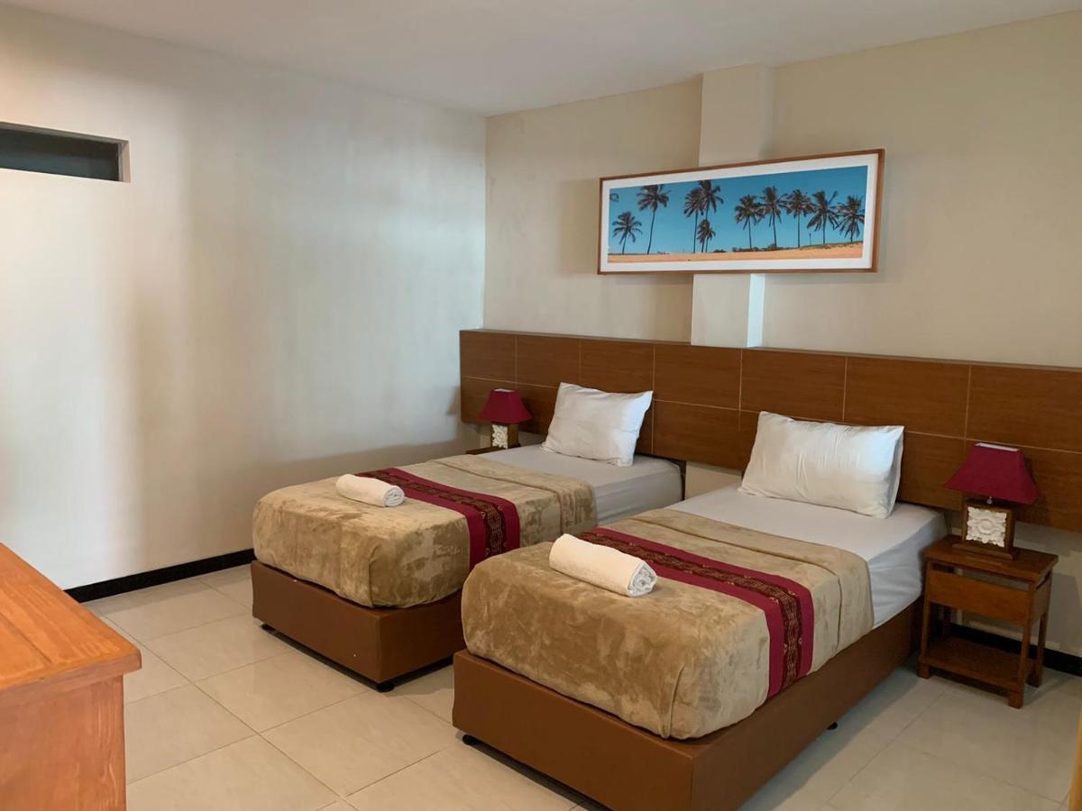 Kuta Suci Guesthouse מראה חיצוני תמונה