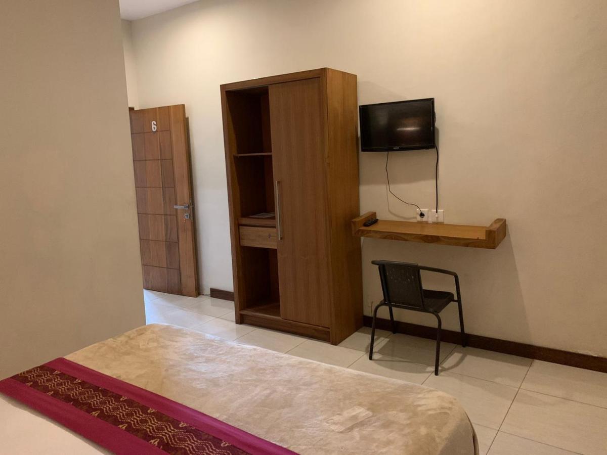 Kuta Suci Guesthouse מראה חיצוני תמונה