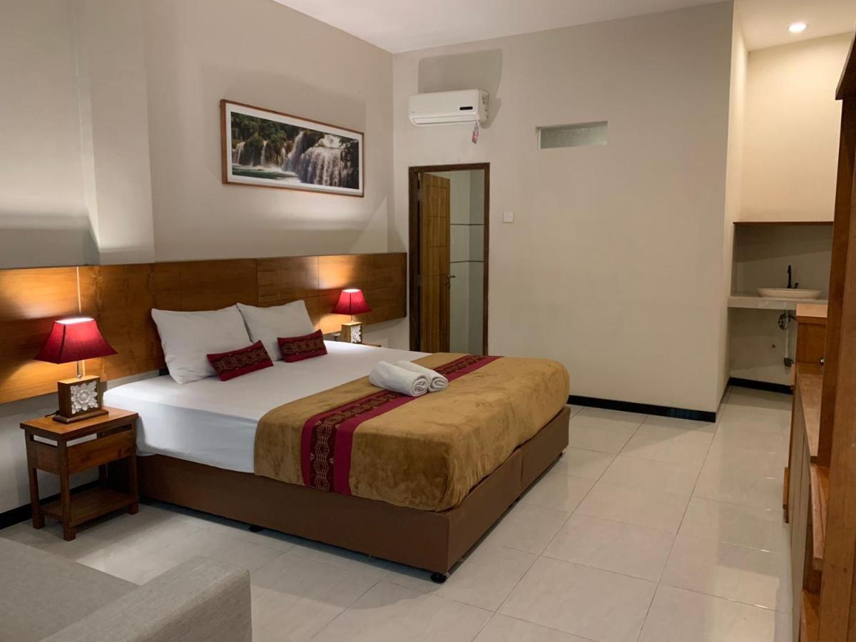 Kuta Suci Guesthouse מראה חיצוני תמונה