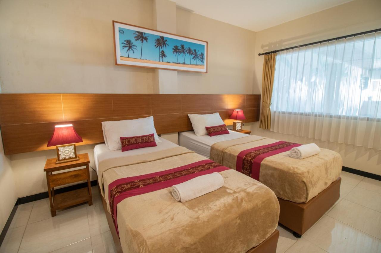 Kuta Suci Guesthouse מראה חיצוני תמונה