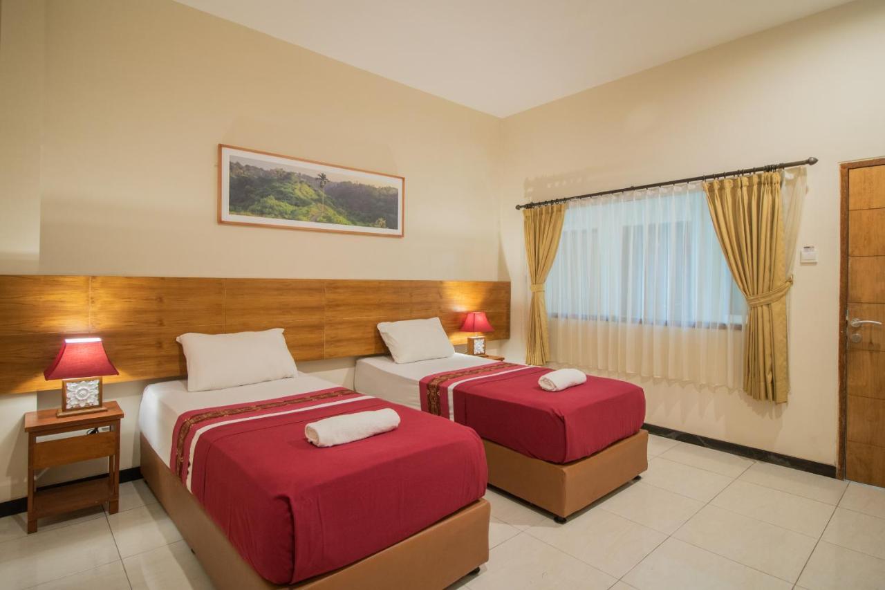 Kuta Suci Guesthouse מראה חיצוני תמונה