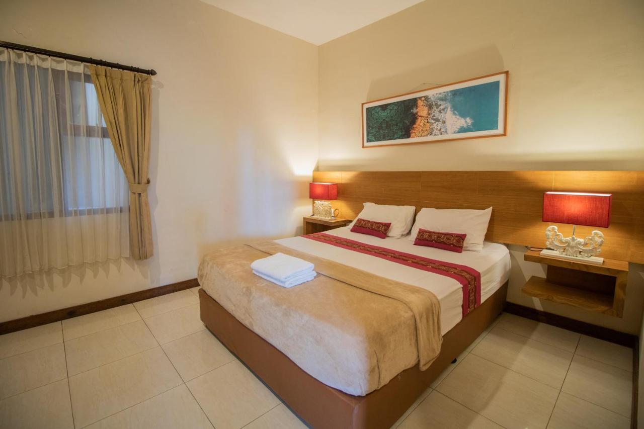 Kuta Suci Guesthouse מראה חיצוני תמונה