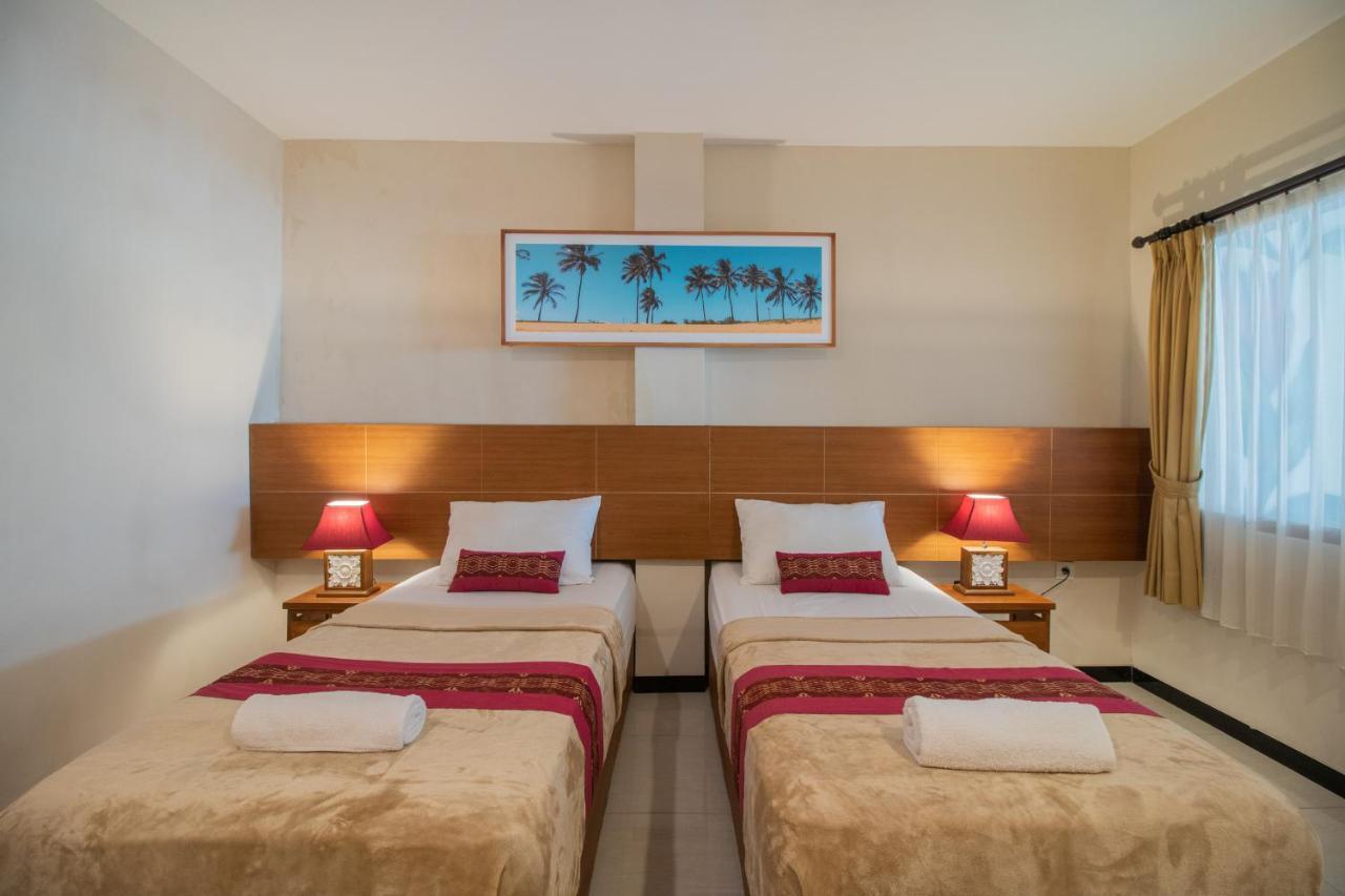 Kuta Suci Guesthouse מראה חיצוני תמונה