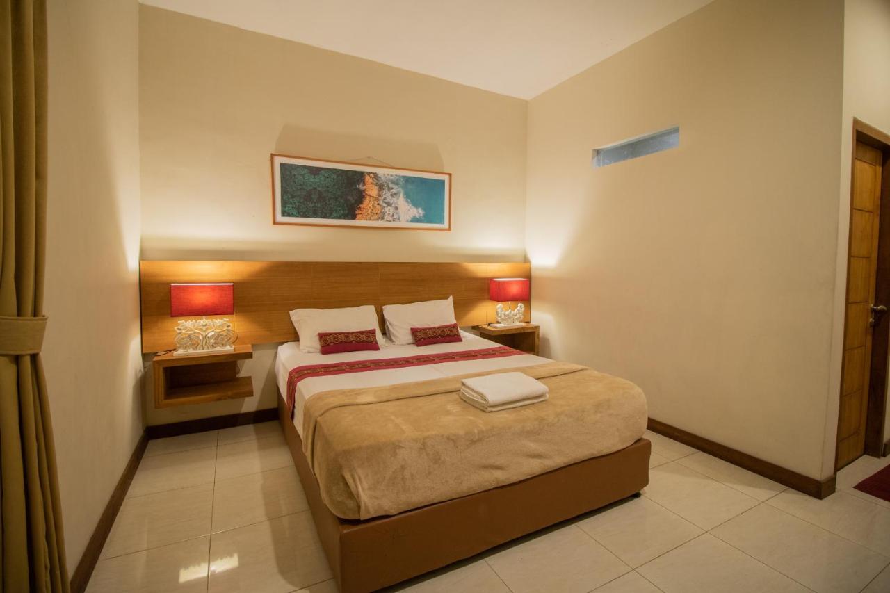 Kuta Suci Guesthouse מראה חיצוני תמונה