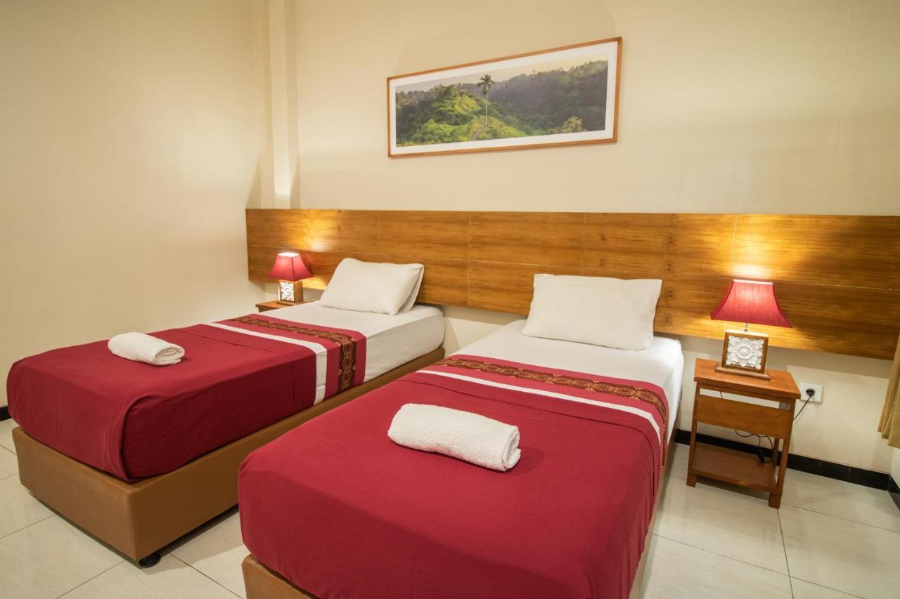 Kuta Suci Guesthouse מראה חיצוני תמונה