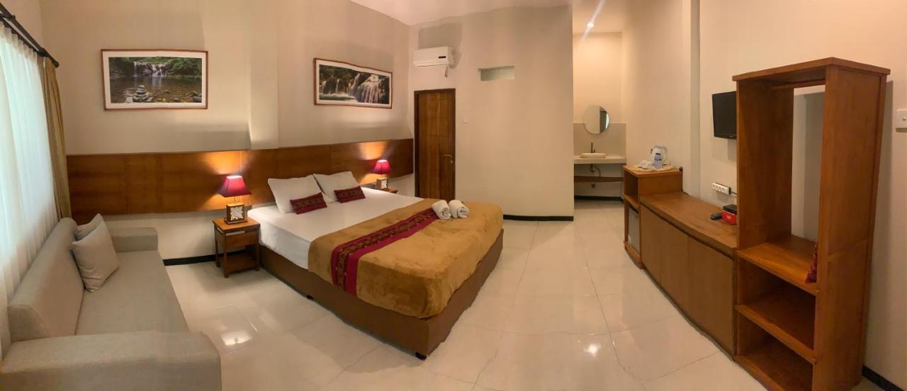 Kuta Suci Guesthouse מראה חיצוני תמונה