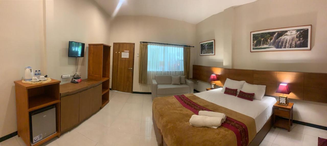 Kuta Suci Guesthouse מראה חיצוני תמונה