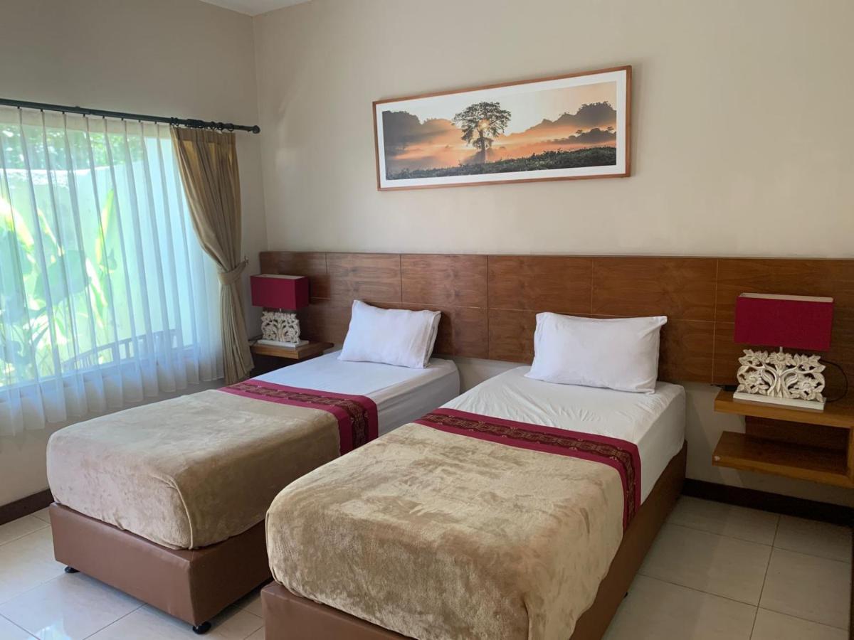 Kuta Suci Guesthouse מראה חיצוני תמונה