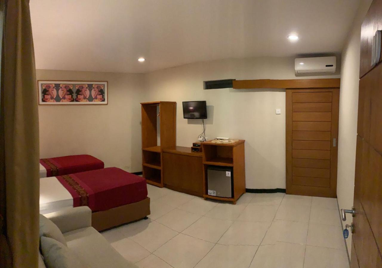 Kuta Suci Guesthouse מראה חיצוני תמונה