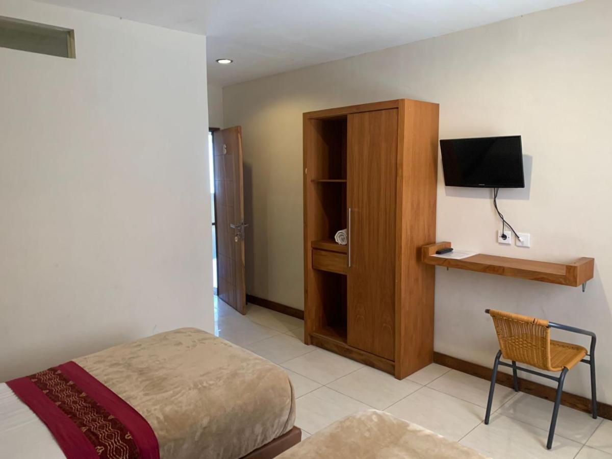 Kuta Suci Guesthouse מראה חיצוני תמונה