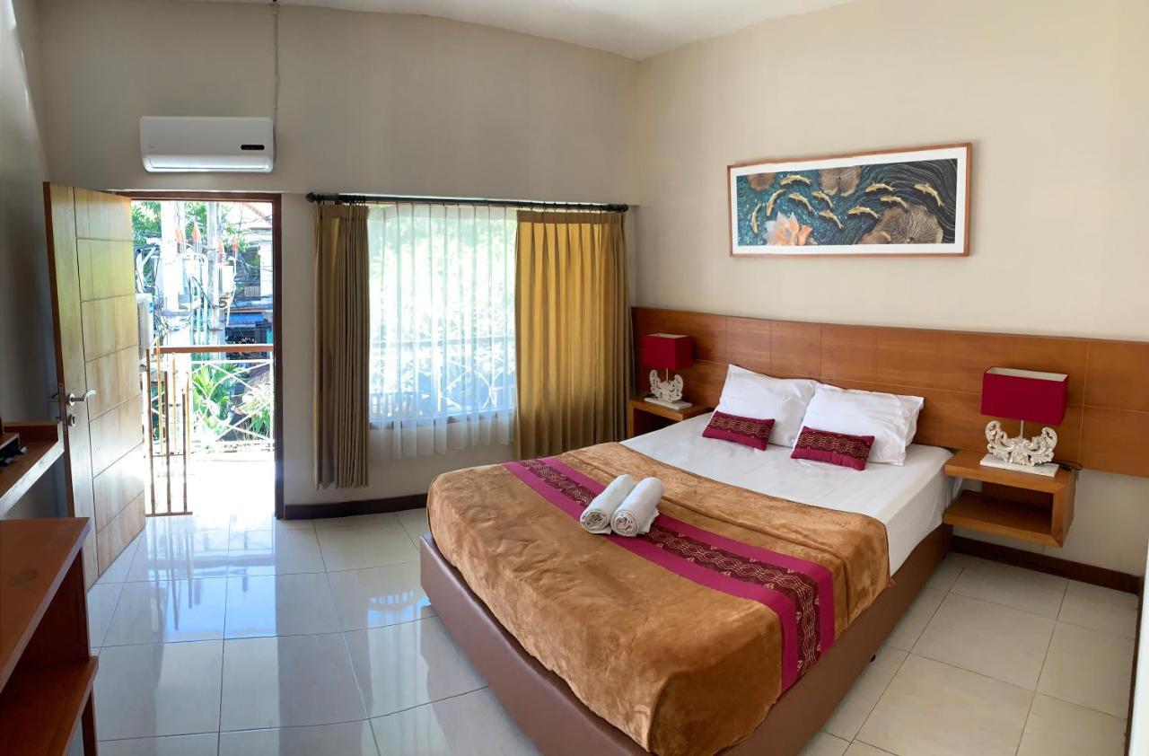Kuta Suci Guesthouse מראה חיצוני תמונה