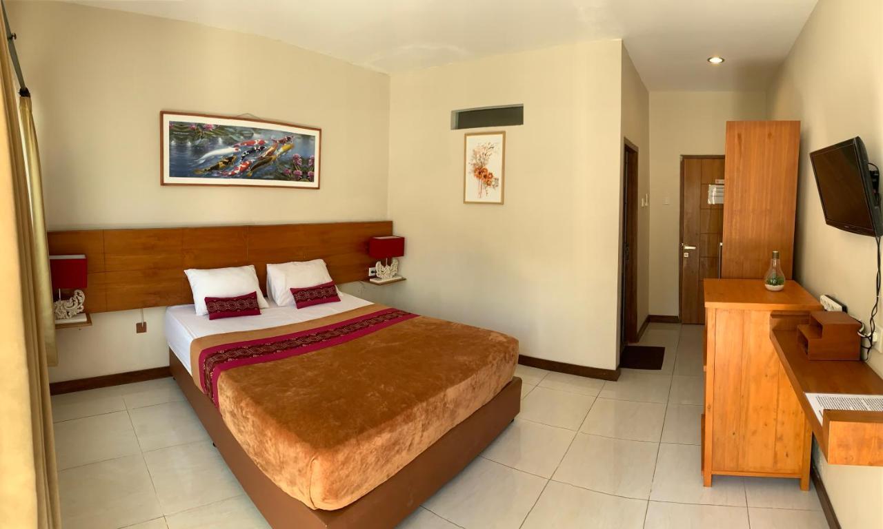 Kuta Suci Guesthouse מראה חיצוני תמונה