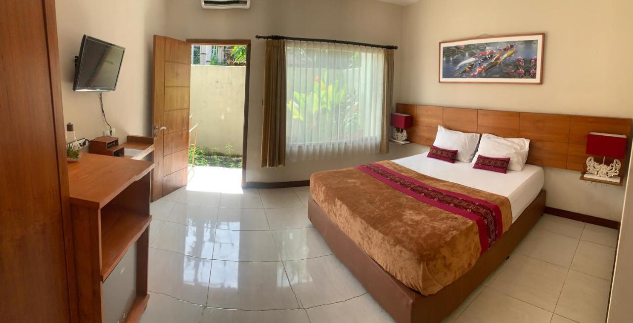 Kuta Suci Guesthouse מראה חיצוני תמונה