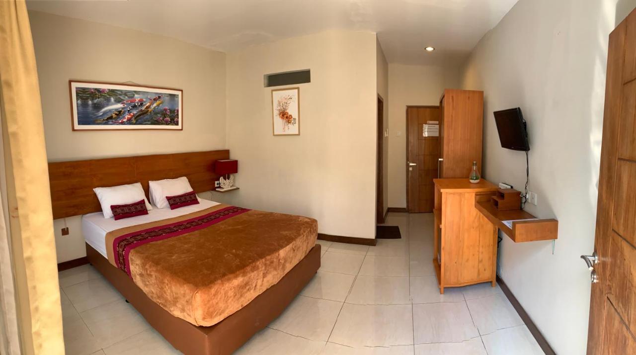 Kuta Suci Guesthouse מראה חיצוני תמונה