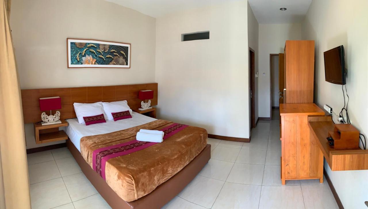 Kuta Suci Guesthouse מראה חיצוני תמונה
