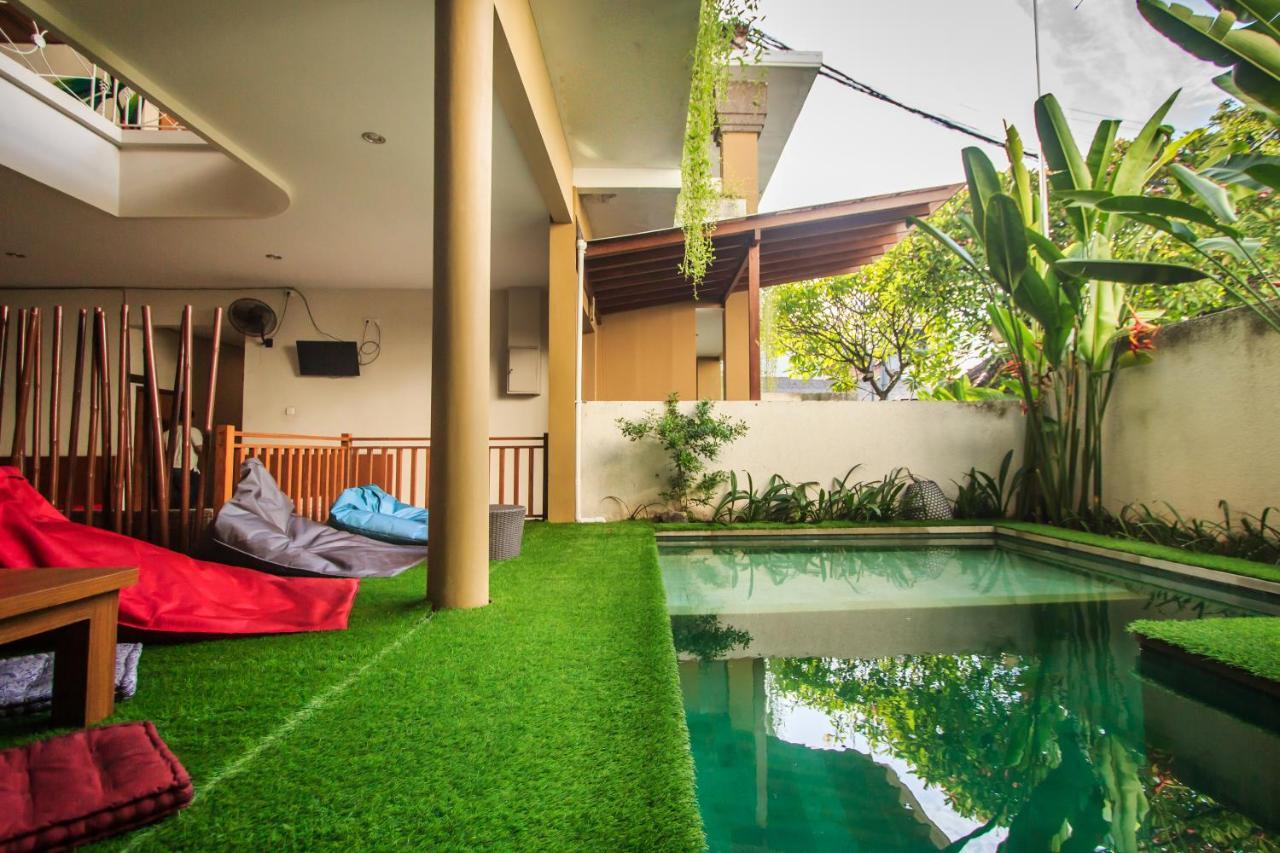 Kuta Suci Guesthouse מראה חיצוני תמונה